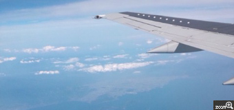 ひまわり／石川県金沢市　「～雲の上～♪」　飛行機から見える地上と飛行機下に見える雲、そしてその上にある雲をまだ飛行機に乗った事の無い祖父の為に撮りました☆乗った雰囲気を味わって欲しくて。。。（*^_^*）