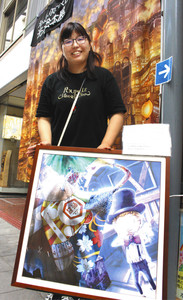 「えんとつ町のプペル」を題材にしたパネル展の開催に尽力した八木さん＝東近江市八日市本町の本町商店街で