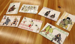 ポストのイラストが描かれた７種のポストカード＝いずれも大鹿村で